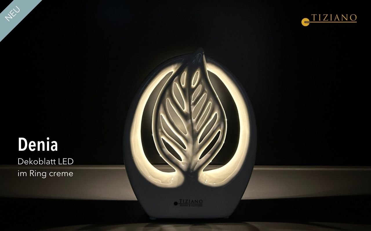 Elegante dekorative LED-Blattlampe in Cremefarbe mit modernem Design und rundem Sockel, ideal zur Aufwertung der Inneneinrichtung und zur Schaffung einer warmen Atmosphäre.