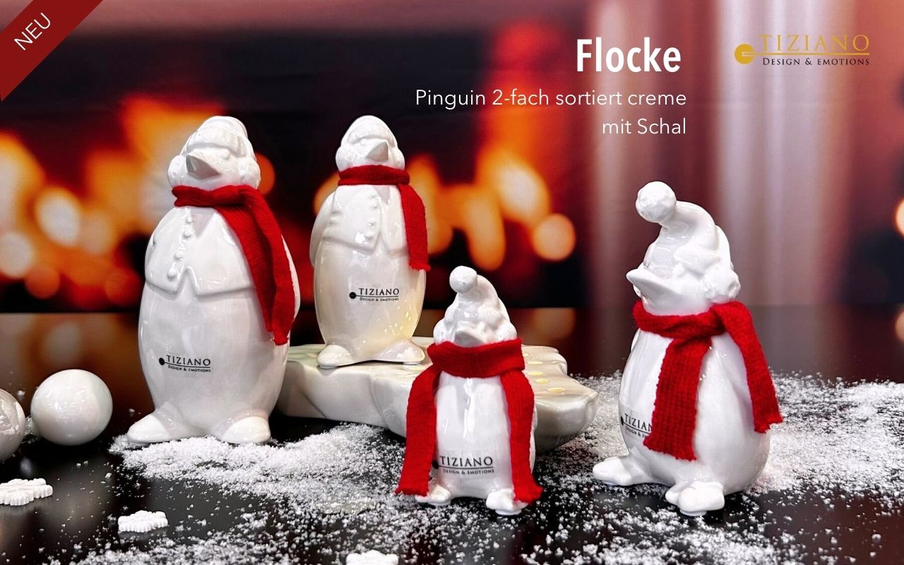 Tiziano Pinguin Flocke mit rotem Schal Tiziano Pinguin Flocke mit rotem Schal